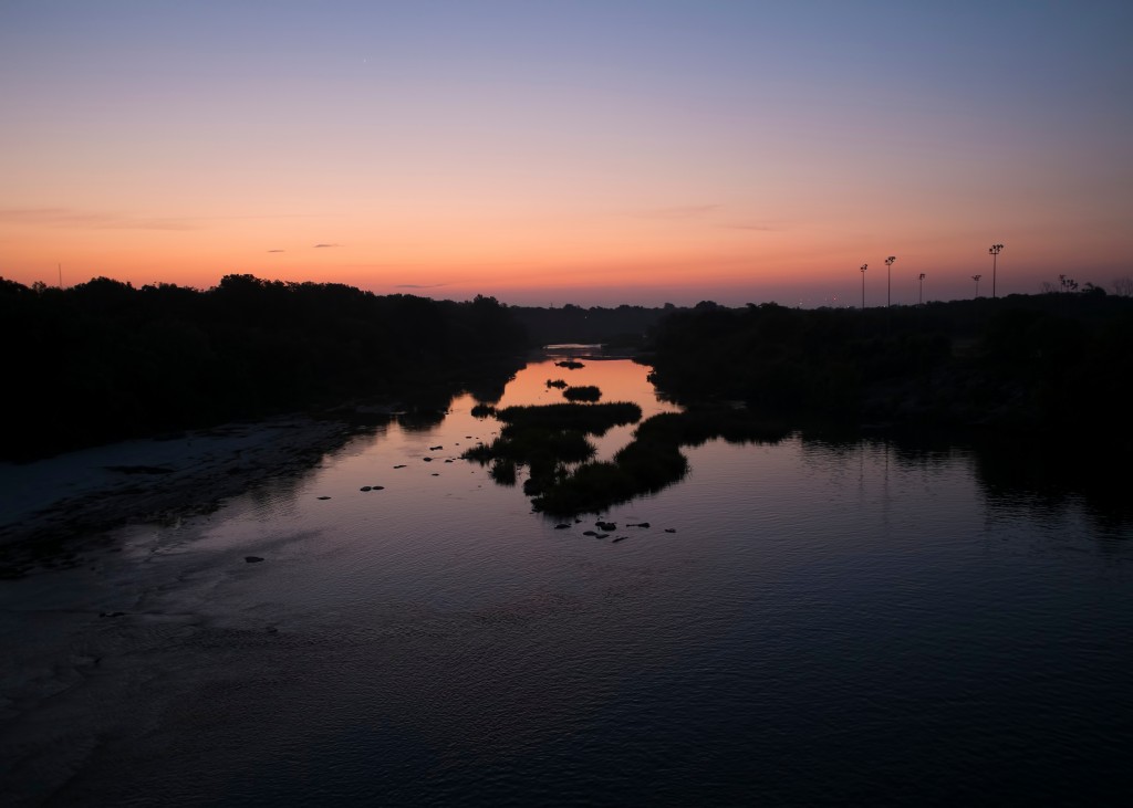 Sunrise on the Colorado River below Longhorn Dam by Ted Lee Eubanks